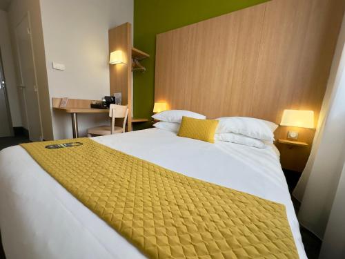 Postel nebo postele na pokoji v ubytování B&B HOTEL Metz Est Technopole Pôle Santé