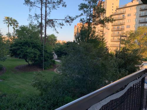 a balcony view of a park with trees and buildings at 12 - Universal Studios, International Dr in Orlando