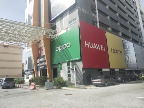 a building with a sign on the side of it at 1010 Homestay at MKH Avenue, Kajang Town in Kajang