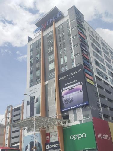 a building with an ad for a car on it at 1010 Homestay at MKH Avenue, Kajang Town in Kajang