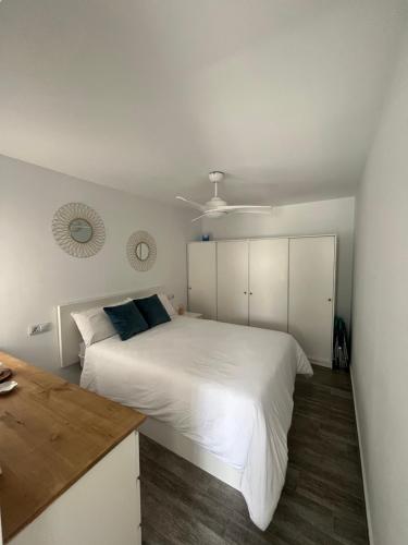 Postel nebo postele na pokoji v ubytování Candela Apartamento