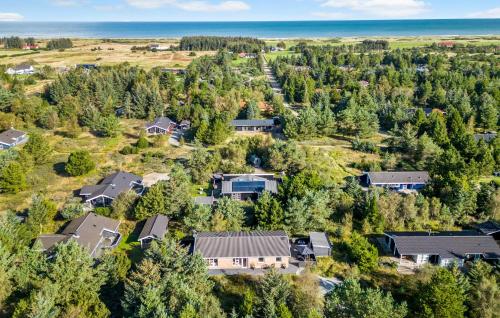 an aerial view of a home in a forest at Cozy Home In Fjerritslev With Wifi in Fjerritslev
