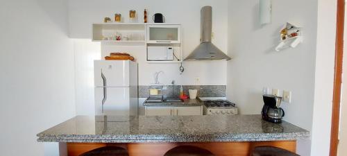 Küche/Küchenzeile in der Unterkunft COARE0101 - Condominio Aldeia Saint Sebastien