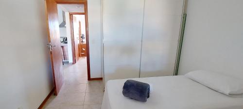 Ein Bett oder Betten in einem Zimmer der Unterkunft COARE0101 - Condominio Aldeia Saint Sebastien