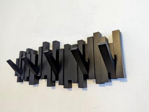 a sign that says the hollywood sign on a wall at Ocean Front Apartments in Arecibo