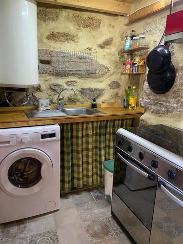 Η κουζίνα ή μικρή κουζίνα στο A Calma