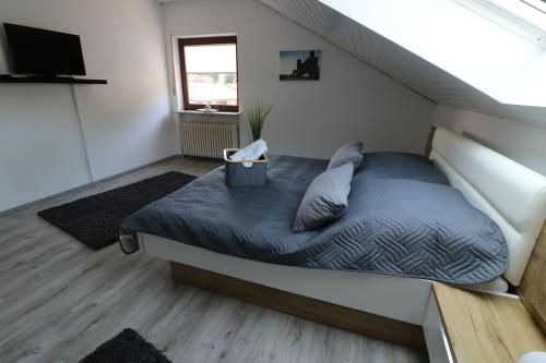 Postel nebo postele na pokoji v ubytování Ferienwohnung Waldblick Dahn