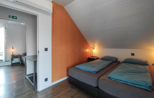 a bedroom with a bed in a room at Beautiful Home In Poperinge With Wifi in Poperinge
