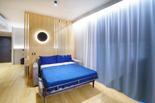 Atarassia suite luxuryにあるベッド