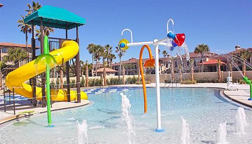 a pool with a water park with a water slide at The Lodge & Club at Ponte Vedra Beach in Ponte Vedra Beach