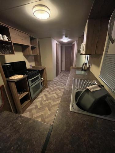 Η κουζίνα ή μικρή κουζίνα στο Golden Sands Mablethorpe 8 Birth Caravan