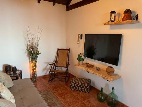 TV a/nebo společenská místnost v ubytování Casa Demetria