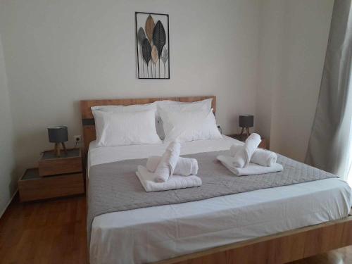 Postel nebo postele na pokoji v ubytování Irene Luxe Loft