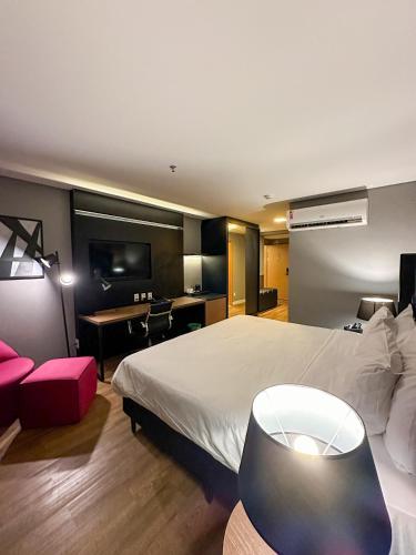 Postel nebo postele na pokoji v ubytování QS Marista Hotel by Atlas
