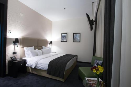 Ένα ή περισσότερα κρεβάτια σε δωμάτιο στο North Avenue by Stellar Hotels, Yerevan