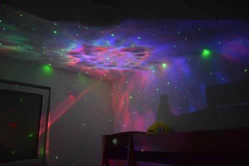 a room with a painting of a star system on the ceiling at Eifelzauber Thielen in Irrel