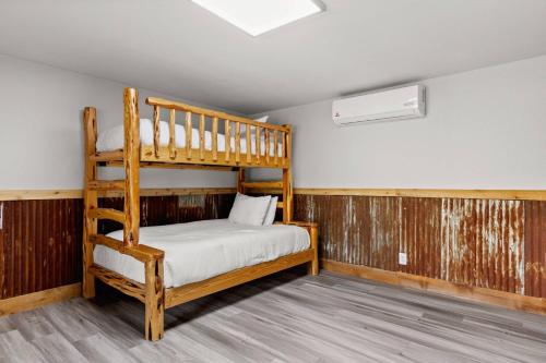 a bedroom with two bunk beds in a room at Piece of Heaven in New Braunfels