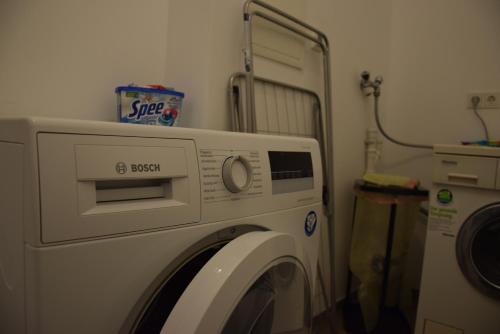 a washer and dryer in a room with at Eifelzauber Thielen in Irrel