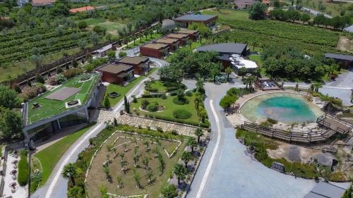 an aerial view of a resort with a pool at Refúgio de luxo com spa, piscina interior e exterior - Pedra Aguda Spa in Fagilde