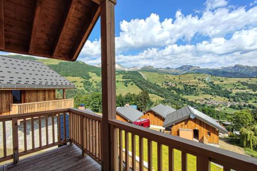 a view from the balcony of a cabin at Chalet Gaspesie - CHALET GASPESIE MAE-6991 in Les Avanchers