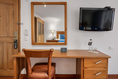 TV a/nebo společenská místnost v ubytování Hotel Egina Bogotá