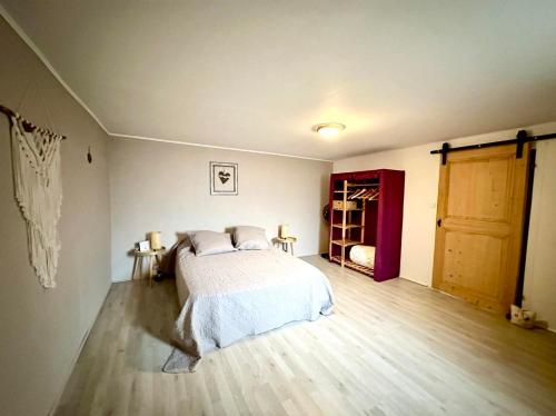 Postel nebo postele na pokoji v ubytování Gîte au Giessen - 1er étage