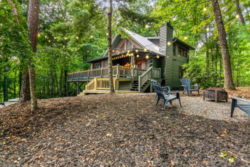 a green house in the middle of the forest at Downward Dog Lodge - Hot Tub, Pool Table, Fireplace, Yoga Den in Blue Ridge