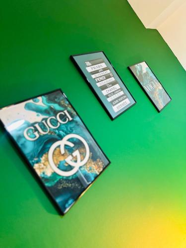a book sitting on top of a green table at Gifford St Retreat 3BR Entire Home in Middlesbrough