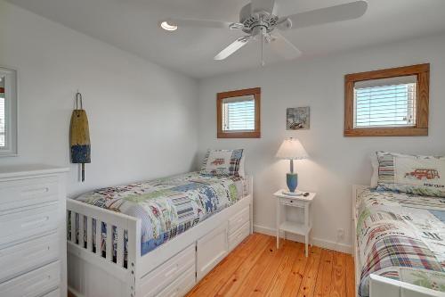 Ένα ή περισσότερα κρεβάτια σε δωμάτιο στο Lucky Dog Cottage SC1