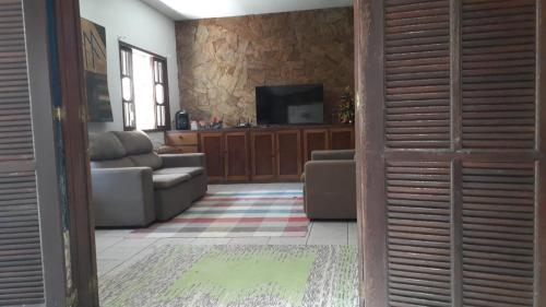 Μια τηλεόραση ή/και κέντρο ψυχαγωγίας στο Hospedagem Paraty Sattva