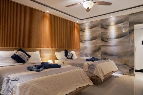 Ein Bett oder Betten in einem Zimmer der Unterkunft Soficu Hotel on the beach bayahibe
