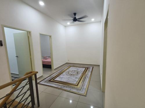 Katil atau katil-katil dalam bilik di Homestay Coway Bertam