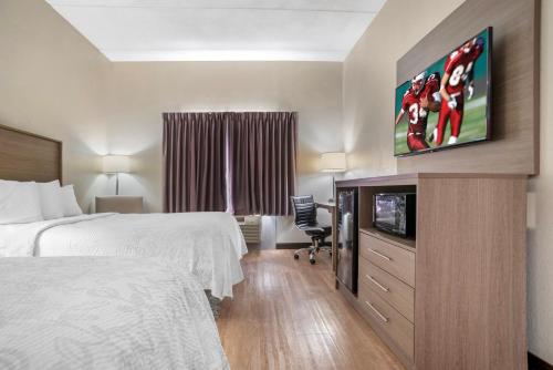 Ένα ή περισσότερα κρεβάτια σε δωμάτιο στο Red Roof Inn & Suites Vicksburg