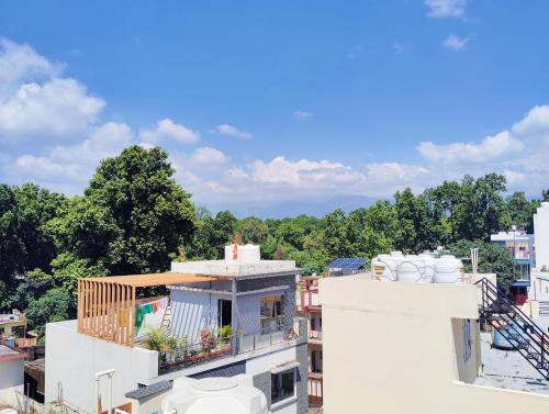a view from the roof of a building at Doon Niwas Homestay 2-Bedroom 1st Floor- Mountain view, near main Picnic Spots, comfortable peaceful central Family-friendly in Dehradun