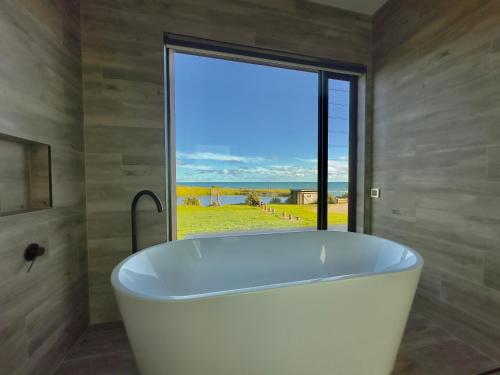 Fotografie z fotogalerie ubytování Luxury Absolute Ocean View Lodge v destinaci Waverley