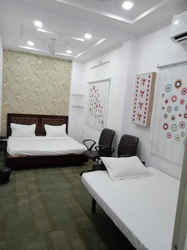 Ένα ή περισσότερα κρεβάτια σε δωμάτιο στο Hotel stay inn