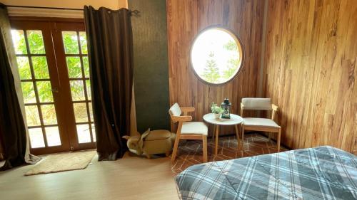 Postel nebo postele na pokoji v ubytování เบาบับ คาเฟ่ & แคมป์ปิ้ง