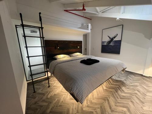 Postel nebo postele na pokoji v ubytování Corcho rooms