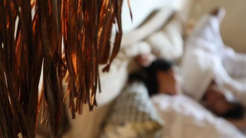 Postel nebo postele na pokoji v ubytování Sleepy Gypsea Villa Siargao - Suite Vibe
