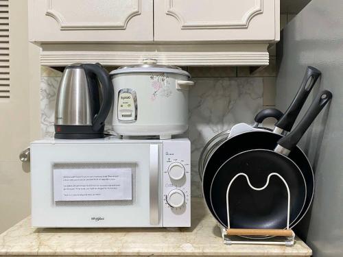 Η κουζίνα ή μικρή κουζίνα στο Vintage-Style Home in Burnham Baguio