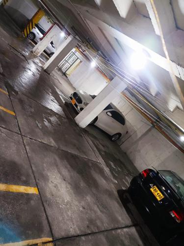 an overhead view of cars parked at a gas station at Hotel Armenia Lions in Armenia