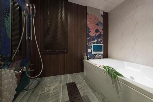 Ванна кімната в Hotel Zen (Adult Only)