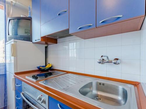 Kuchyň nebo kuchyňský kout v ubytování Studio Apartment Ecija ST