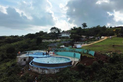 an overhead view of a swimming pool in a park at Viewscape Nature Park Tanay powered by Cocotel in Tanay