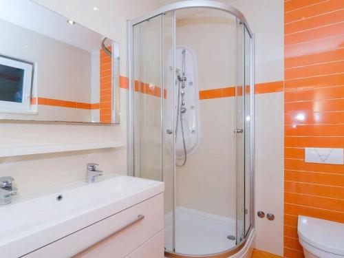 a bathroom with a shower and a sink at Apartments Villa Bella Vista - Two Bedroom Apartment with Balcony and Sea View in Potomje
