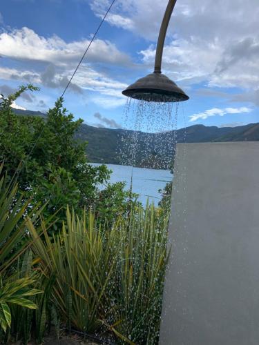 a bird bath with water coming out of it at Tres Marias Chivor in Batá