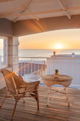 Area soggiorno di The Sandcastle Guesthouse - Melkbosstrand