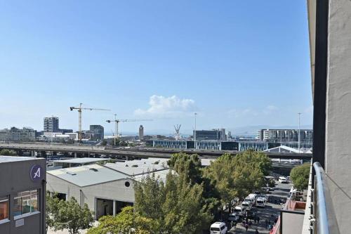 a view of a city from a building at Bella - Stylish 1-Bed Apt in trendy De Waterkant with Balcony in Cape Town