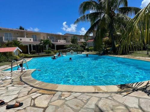 At home by the pool in Mauritius - with a cause