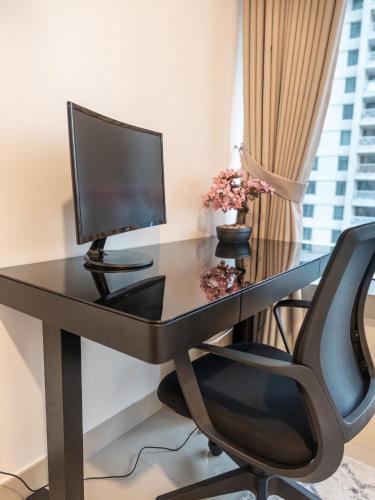 TV o dispositivi per l'intrattenimento presso New Burj Khalifa & Fountain Views & Work station